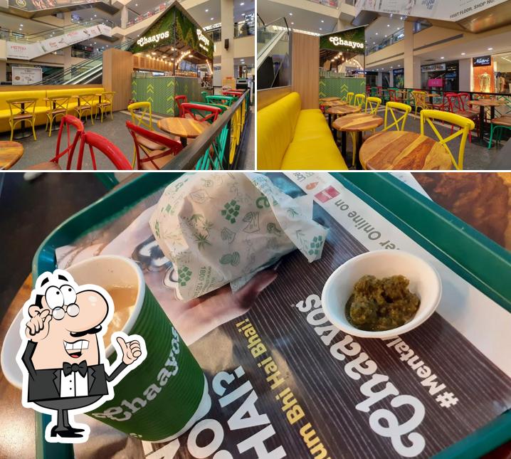 The picture of interior and beverage at Chaayos Cafe at Shipra Mall