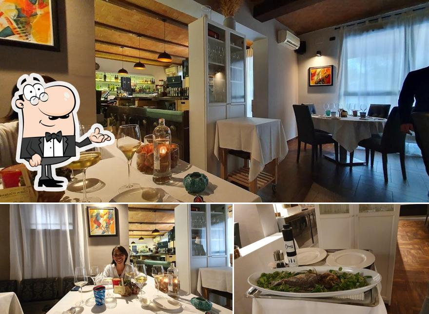 Dai un'occhiata agli interni di Olimpia Restaurant