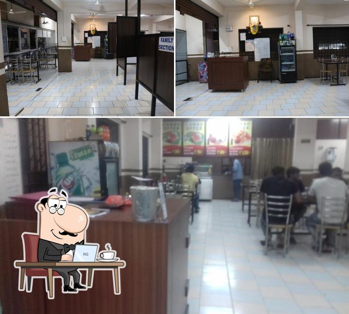 Take a seat at one of the tables at Dolphin Lunch Home