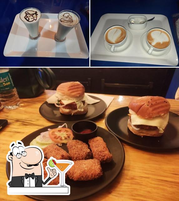 Check out the picture depicting drink and burger at GM Cafe