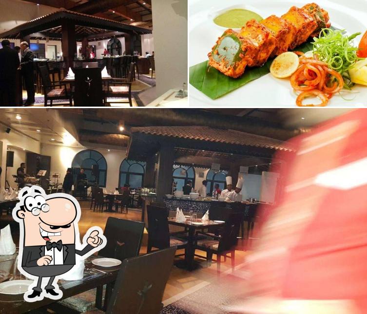 Take a look at the image depicting interior and food at Jannat