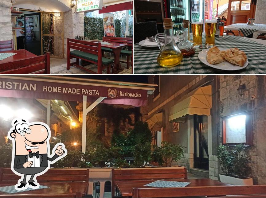 Guarda la foto che raffigura la interni e birra di Kristian Pizza