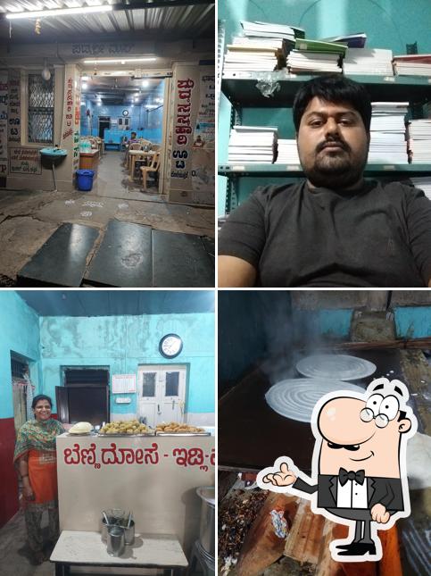 Take a seat at one of the tables at Padmashree mess ಪದ್ಮಶ್ರೀ ಮೆಸ್