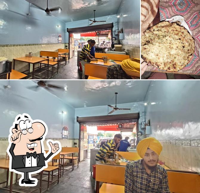 Among various things one can find interior and food at Amritsarii Kulcha
