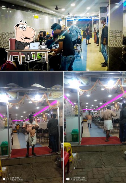 The interior of Temple City Veg family Restaurant
