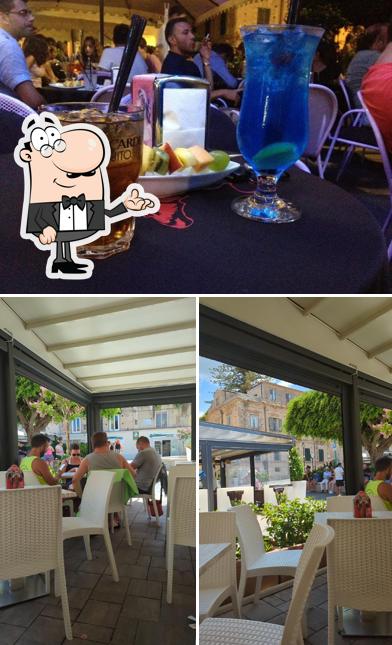 La foto di interni e tavolo da pranzo da Bar Veneto Tropea