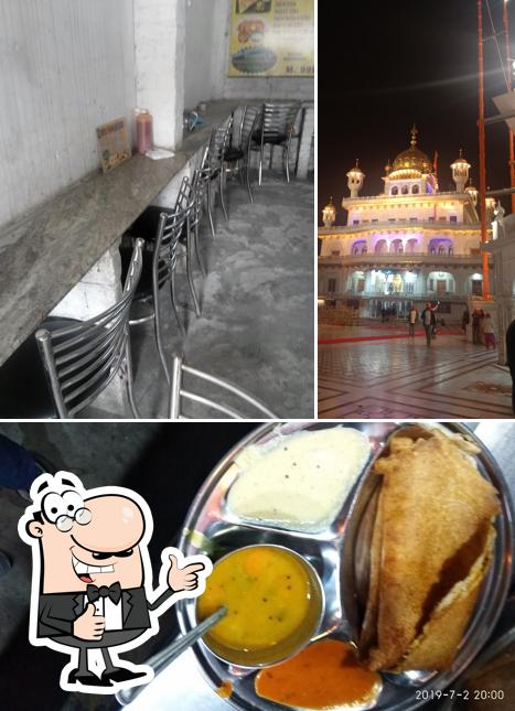 Look at this photo of Rajan South Indian Dosa