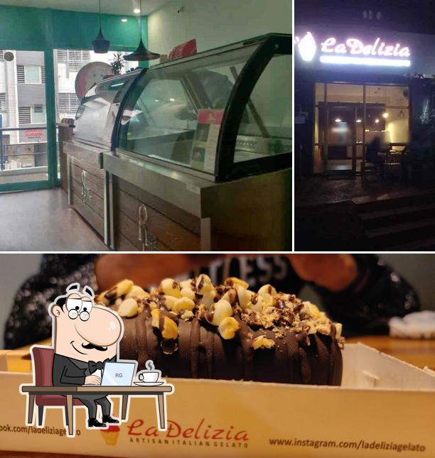 Take a seat at one of the tables at La Delizia (Gelato)