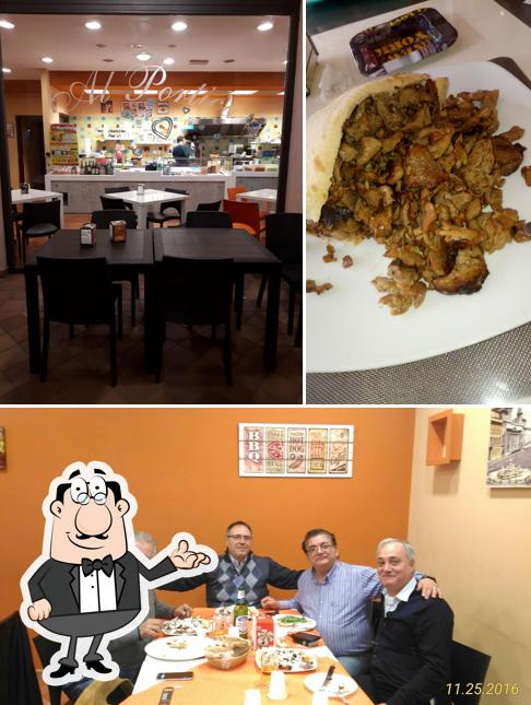 Dai un’occhiata alla foto che presenta la interni e cibo di Al Portico
