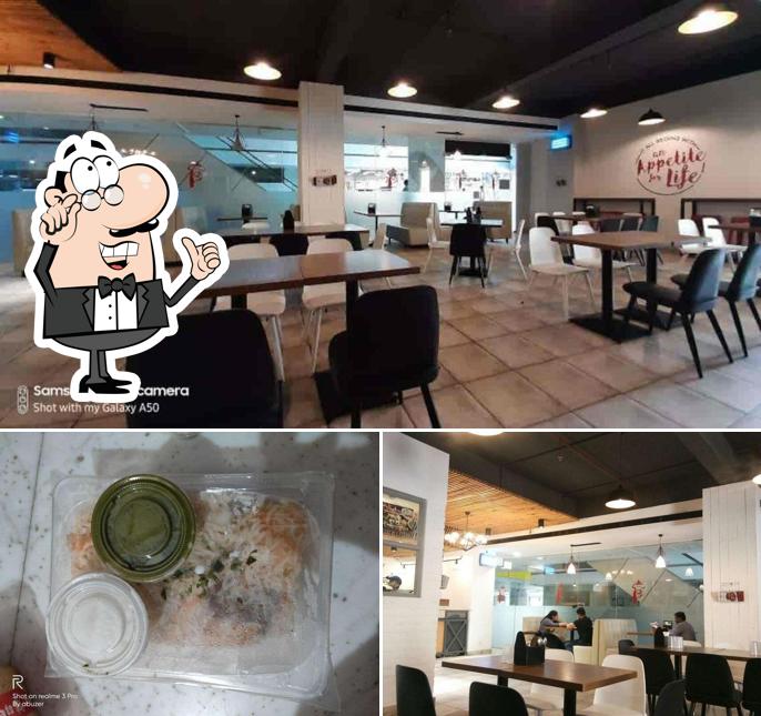 This is the picture displaying interior and beverage at Khan Baba