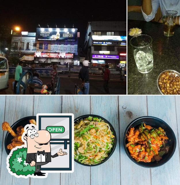 This is the picture displaying exterior and food at Green Palace Bar & Restaurant