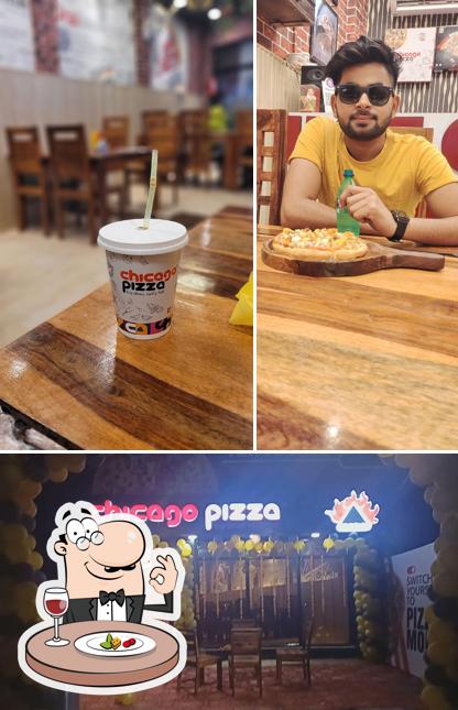 This is the photo depicting food and interior at Chicago Pizza Orai Best Pizza in Orai