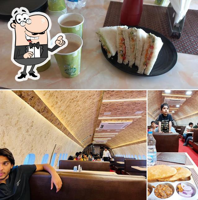 This is the photo showing interior and sandwich at Aeroplane 737 restaurant