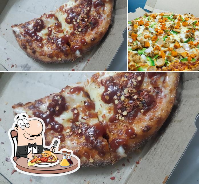 Try out pizza at Pizza Kingdom's