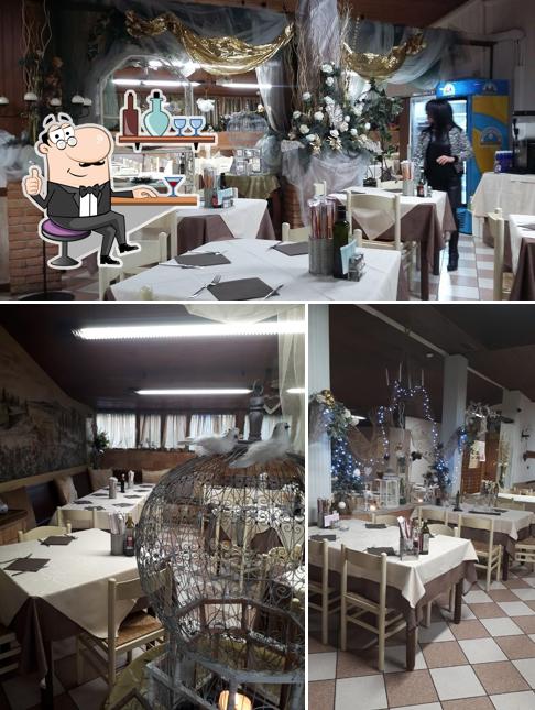 Siediti a un tavolo di Trattoria Pizzeria la Sorgente