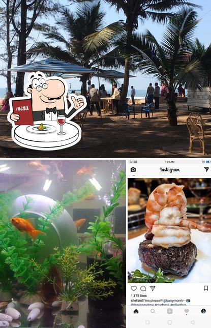 Check out the picture depicting food and interior at Ohana Malvan