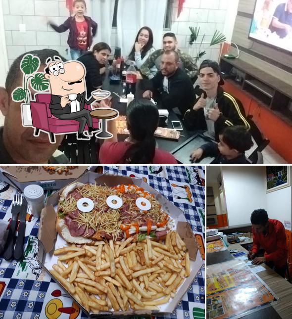 A ilustração da interior e comida a Pizzaria Esfiharia e Hamburgueria D'Lara