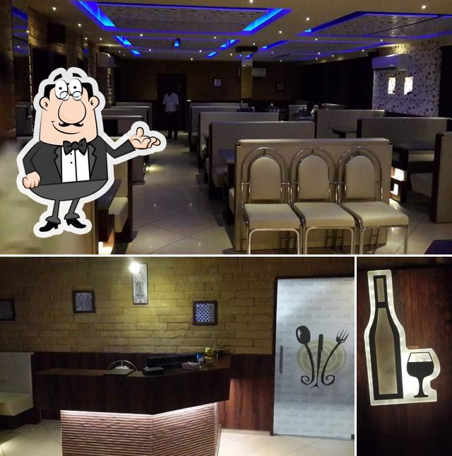 The photo of interior and wine at Swati Restaurant