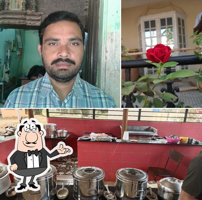 Take a seat at one of the tables at Padmavathi Family Restaurant