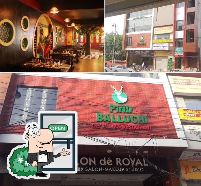 This is the photo showing exterior and bar counter at Pind Balluchi