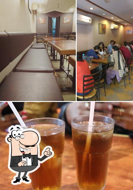 Check out the picture showing interior and beer at Amar Jyoti Restaurant