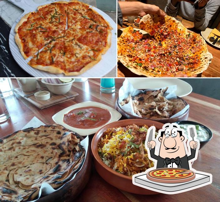 At Copper Chimney - Authentic Indian Food Near Bandra East (BKC), you can get pizza