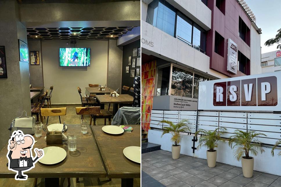 Take a seat at one of the tables at RSVP NAGPUR(Restro-bar,Rooftop & Rooms)