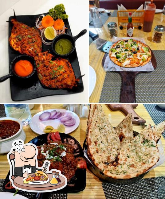 Order pizza at BHAIRAVIS BANQUET