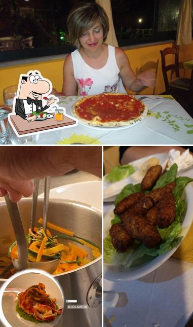 La immagine di cibo e tavolo da pranzo da La Giara / Pizzeria - Ristorante