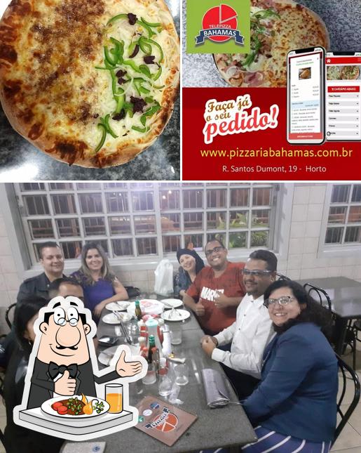 A imagem da comida e interior no Pizzaria Bahamas