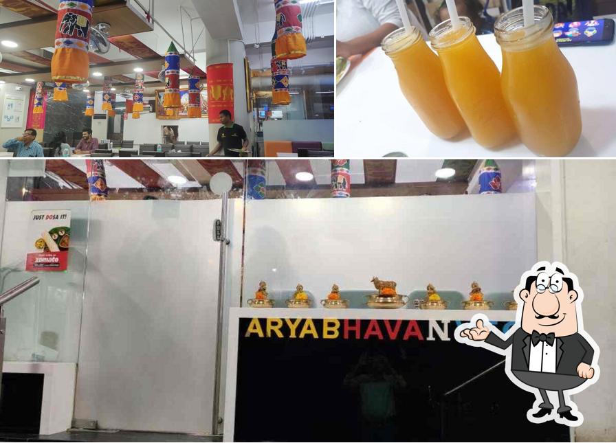 This is the image displaying interior and beverage at Arya Bhavan
