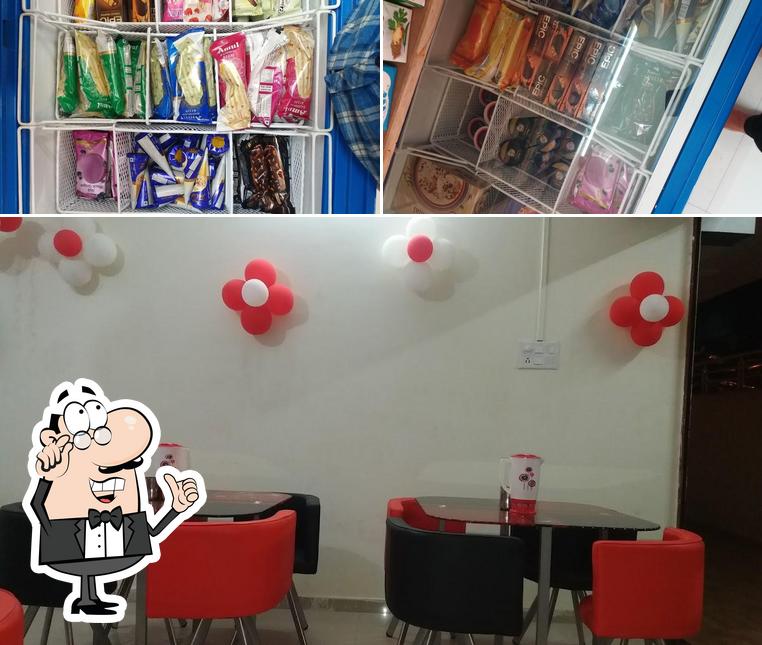 The interior of Cafe Fusion Snacks & Amul Ice Cream