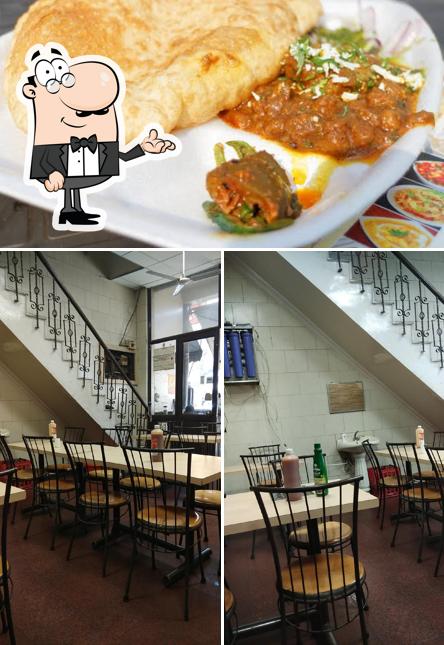 This is the image depicting interior and food at Kamal Restaurant