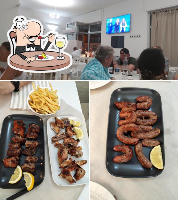 Questa è la foto che presenta la cibo e interni di Braceria Grill House