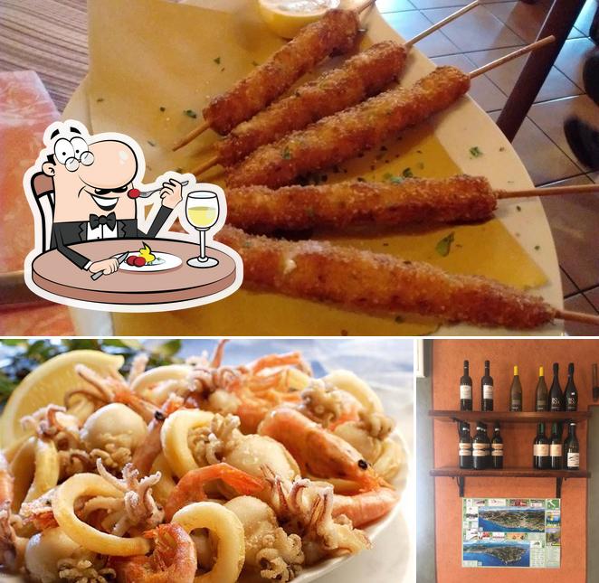 Trattoria da ö Tuggiu si caratterizza per la cibo e alcol