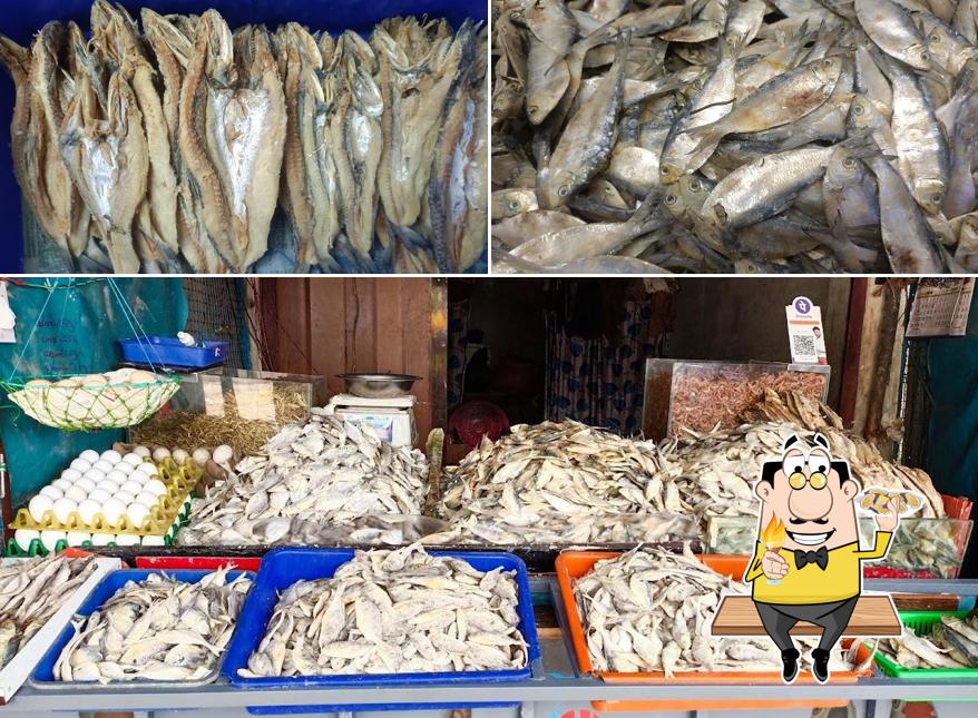 Order seafood at Dry fish spot hole sail and retail enath