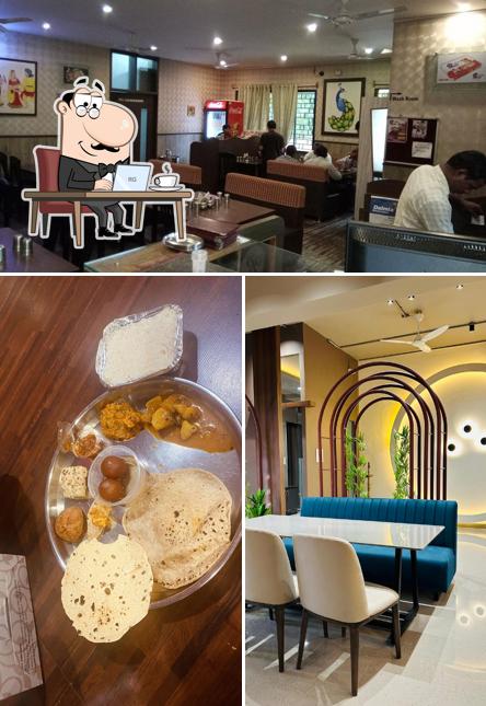 Take a seat at one of the tables at Rasoi Veg Thali