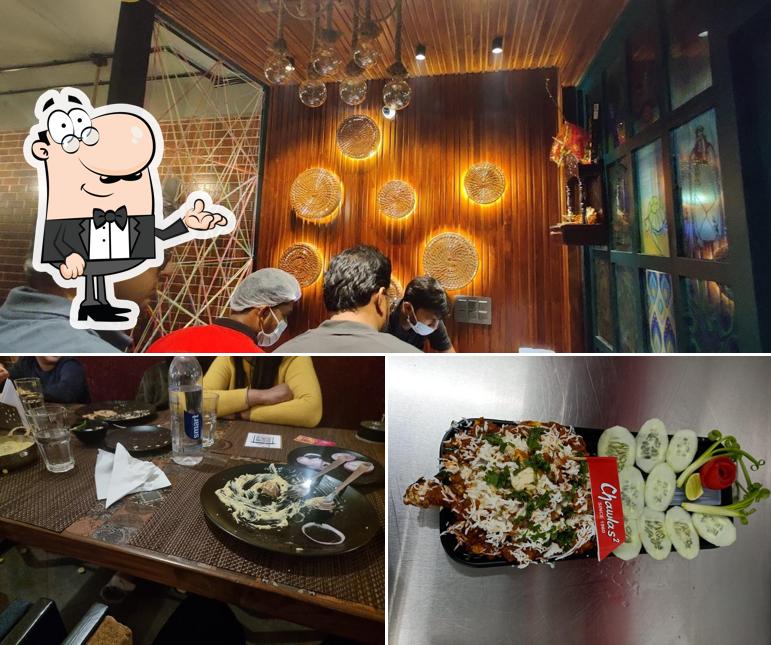 Chawlas 2 Restaurant Since 1960 Famous Taste of Punjab - Veg, Non-Veg, Fast Food Near Me is distinguished by interior and pizza