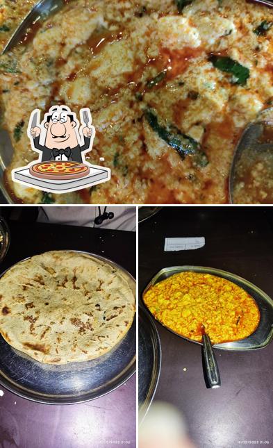 Get pizza at Pooja Parlour