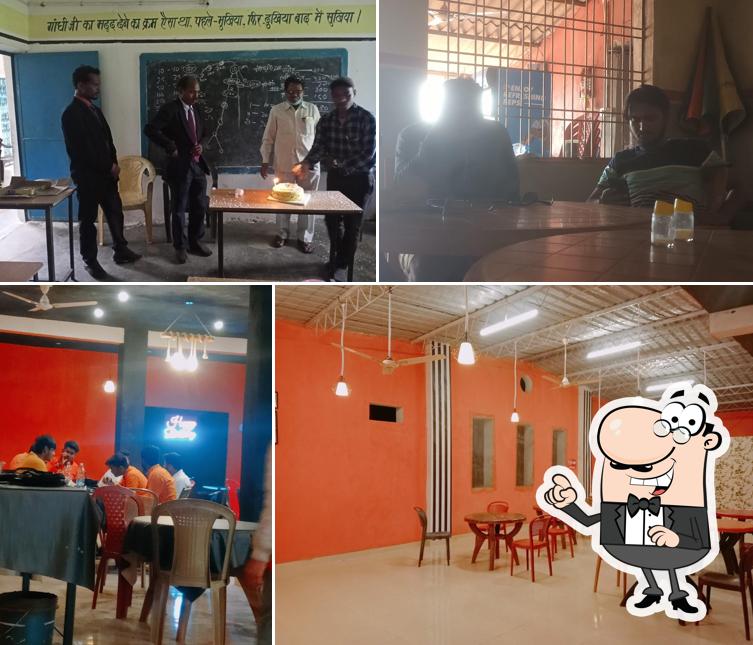 Take a seat at one of the tables at NANA JI FAMILY DHABA