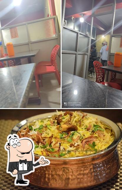 The photo of interior and food at ROYAL BIRYANI MADIKERI (حلال)