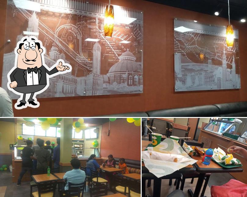 Take a seat at one of the tables at Subway Thillainagar