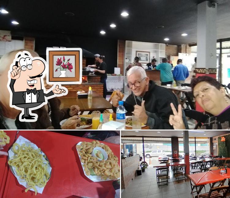 Entre diversos coisas, interior e comida podem ser encontrados a Dom Cabral Restaurante e Pizzaria