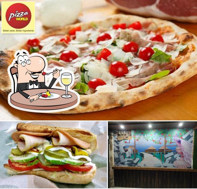 The photo of Enjoy Pizza Plus’s food and interior