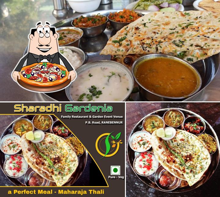 Get pizza at Sharadhi Gardenia Family Restaurant Mruthyunjaya Nagar Ranebennur