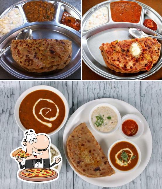 Try out pizza at Parathas