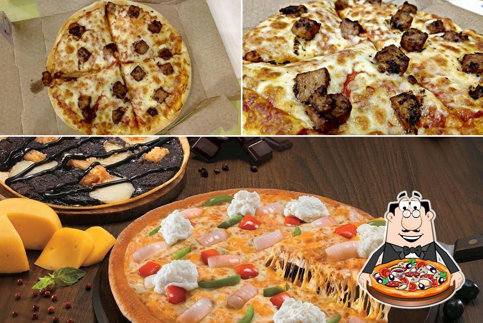 At Domino's Pizza Nexus Mall, Hyderabad, you can try pizza At Domino's Pizza Nexus Mall, Hyderabad, you can try pizza