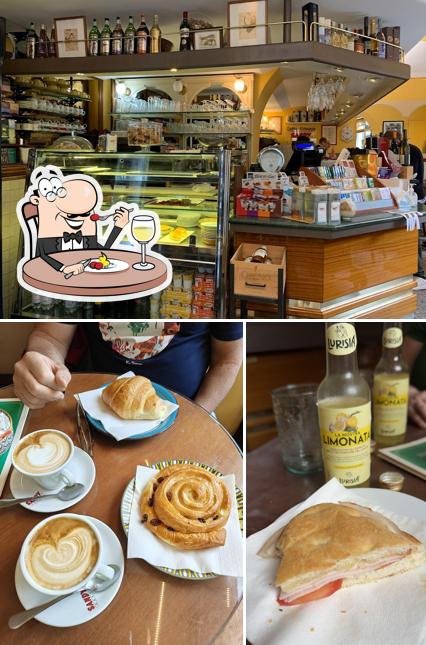 Tra le varie cose da Caffé Vittoria si possono trovare la cibo e interni