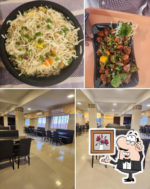 The photo of interior and food at Thoovi Family Dining