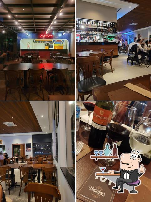 O interior do Espaço Tangerina Pizzaria